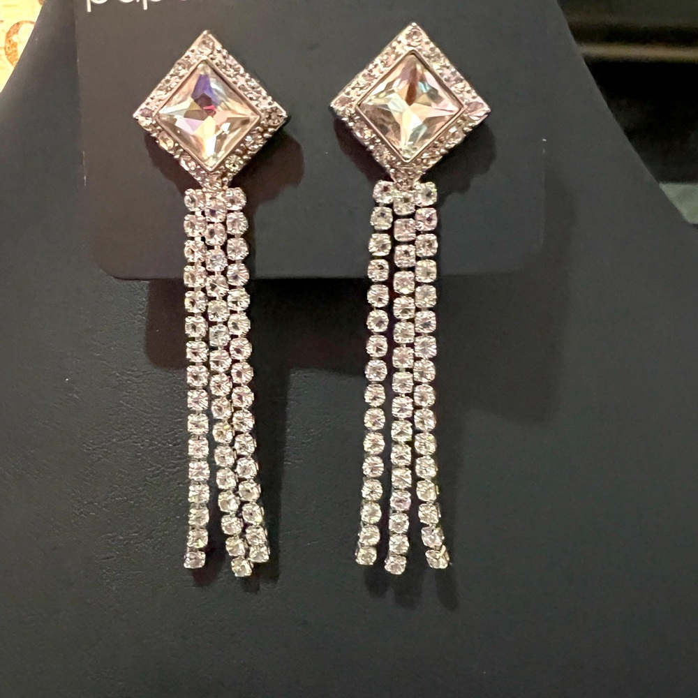 Silver with White Rhinestones. Dangles with Beauty and Confidence